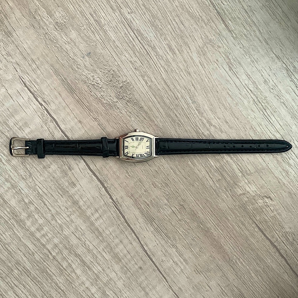 Vintage Roman numeral black leather watche